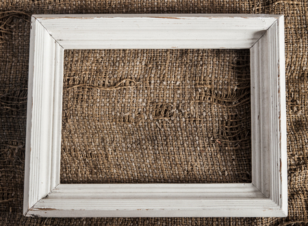 vintage wooden  frame on the burlap.の写真素材