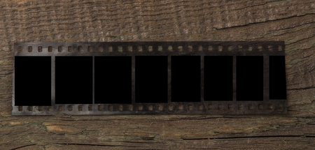 negative film on wooden tableの写真素材