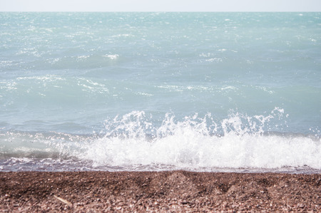 Wave on a pebble beach