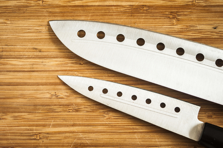 set of kitchen knives on a cutting board set of kitchen knives metalの写真素材