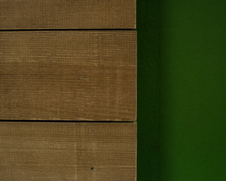 Blank green chalkboard with traces of erased chalkの写真素材