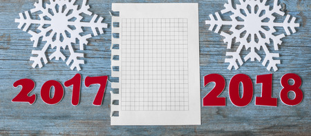 numbers forming the number 2018, for the new year 2018 on rustic wooden background with christmas...