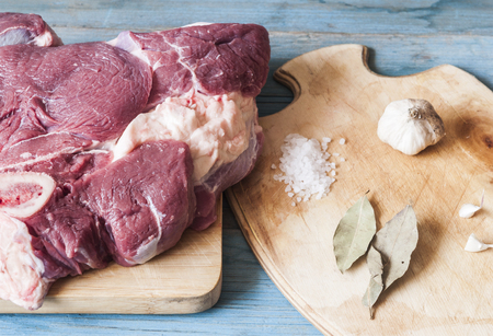 Raw meat. Raw beef steak on a cutting board の写真素材