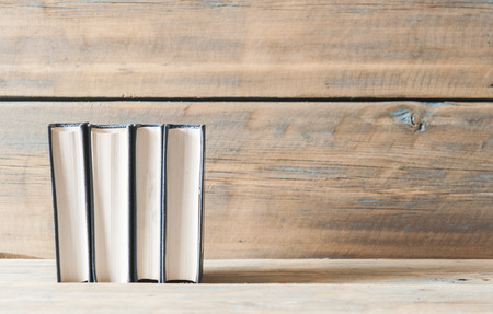 stack of old books with vintage backgroundの写真素材