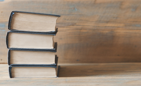 stack of old books with vintage backgroundの写真素材