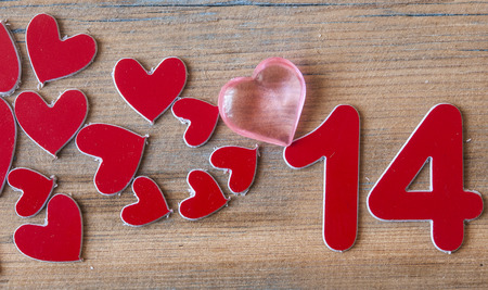Love hearts on wooden texture background. Valentines day card concept.