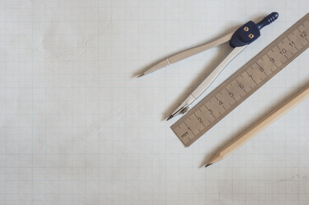 Geometry set with compass, ruler on graph paperの写真素材