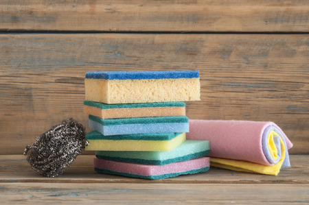 Tools for cleaning. Set of tools for cleaning on wooden background.の写真素材
