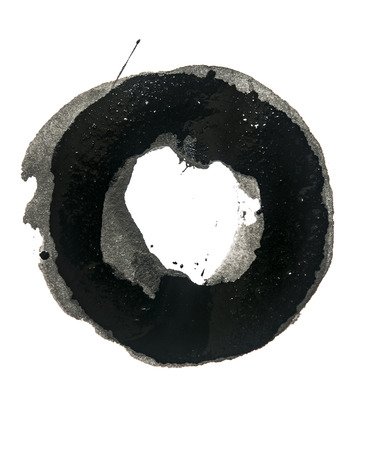 Brush stroke circle texture in black. Isolated on white.の写真素材