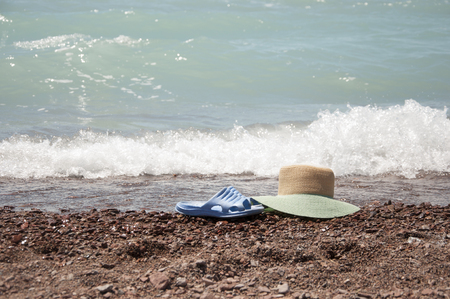 flip flops sandal on beach and sea wave.Summer holiday.の写真素材