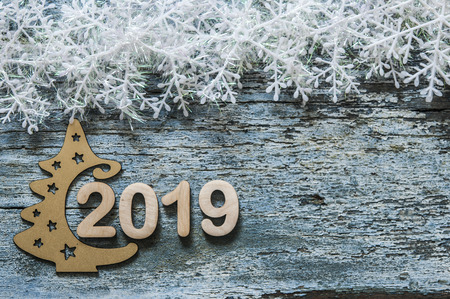 Happy New Year 2019. Symbol from number 2019 on blue wooden background.の写真素材
