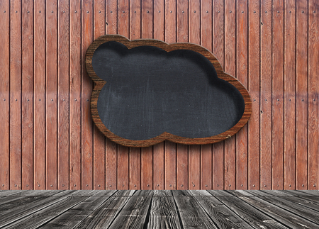 speech bubble blackboard on wooden wall backgroundの写真素材
