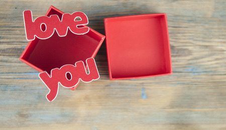 gift box on wood table background with copy spaceの写真素材