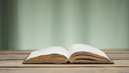 open book on wooden tableの写真素材