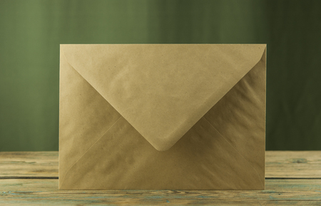 Blank envelopes on wooden table background. の写真素材