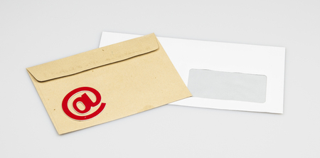 sign e-mail, paper letters on a white background. Internet, correspondence.