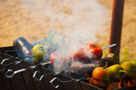 vegetables on the grill over low heat for preparingの写真素材