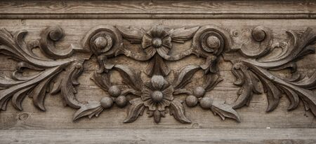 Old wooden decorative carving pattern, background photo texture