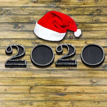 2020 Happy New Year seasonal background with real wood background. Aged parquet of pine wood for...