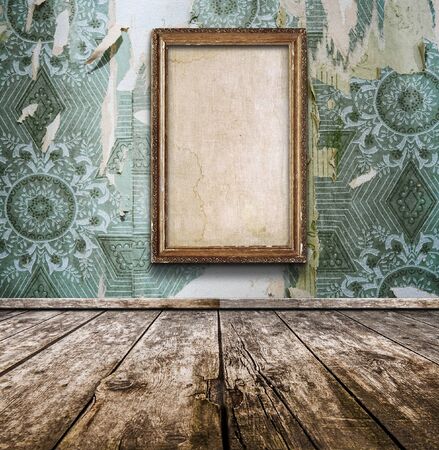 old wooden room with wallpaper and vintage frame. Rustic interior design.の写真素材