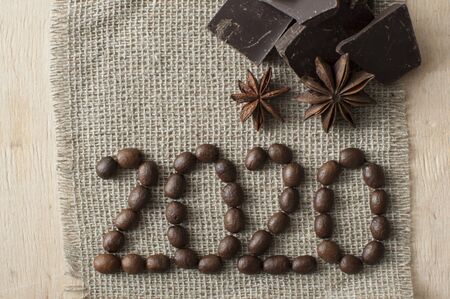 2020 made from coffee beans on burlap cloth backgroundの写真素材