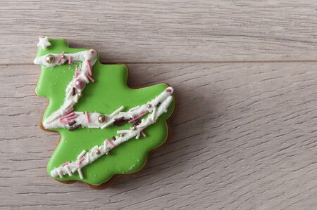 Christmas tree shaped cookie decorated with fondant.の写真素材