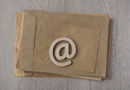 brown envelope with e-mail signの写真素材