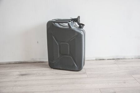 Old green metal fuel tank for transporting and storing petrolの写真素材