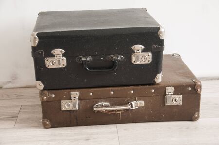 Vintage  weathered old classic travel leather suitcases. Travel luggage concept.の写真素材