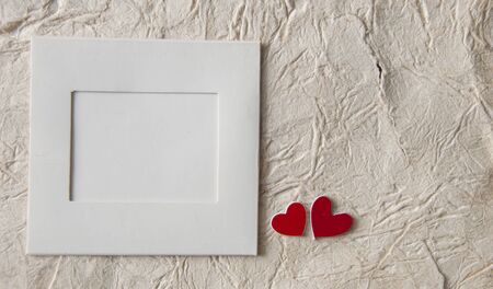 Valentines day background: old cardboard texture with red heart の写真素材