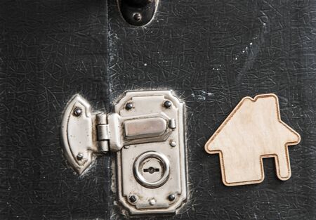 Close-up view of an old vintage suitcase lock