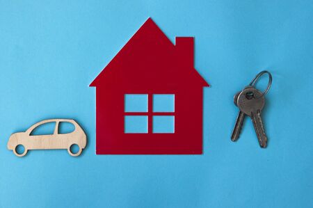 Real estate concept. Car models and house models on background. Concept Finance. Financing for home loans. investment concept.の写真素材
