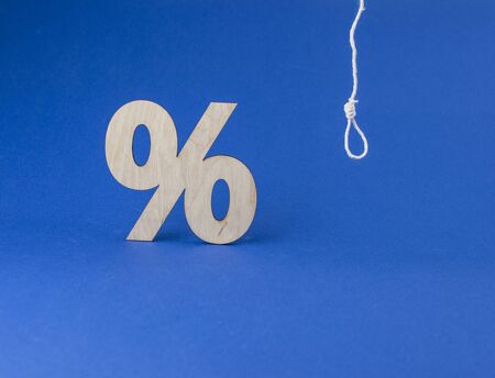 Hinge for the gallows with wooden sign percent on a dark blue background 