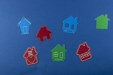 Miniature house on blue background. Top view.   Buy of property, home, real estate. affordable housing. advantageous offer from the bank.の写真素材