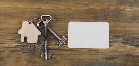 keychain with house symbol with a pure card for the text. Real estate conceptの写真素材