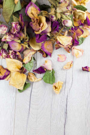 bouquet dried roses on wood background with copy spaceの写真素材