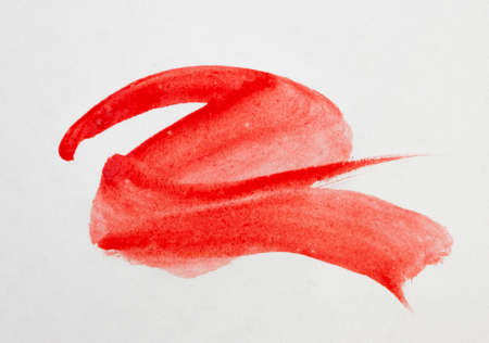 watercolor red brush stroke on white paper background