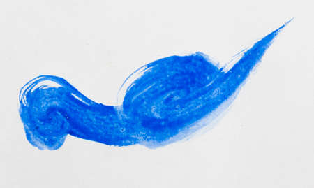 blue stroke of the paint brush on white paperの写真素材