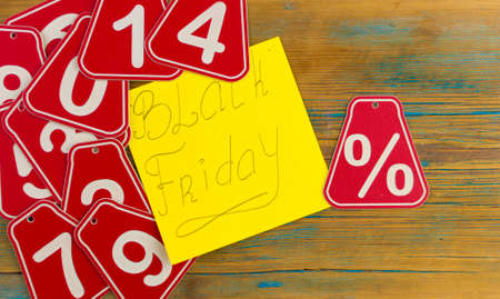 Black Friday handwriting text close up on sticky notes with copy space. Writing text on memo post reminderの写真素材