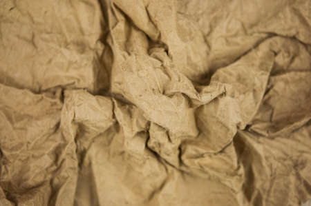 Brown wrinkle recycle paper backgroundの写真素材