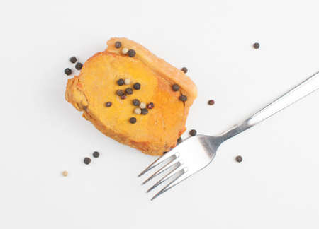 Pieces of boiled meat on a white background.の写真素材