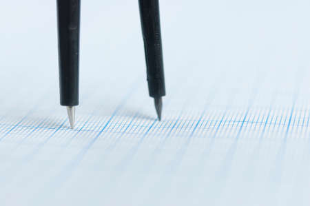 Drawing compass on graph paper