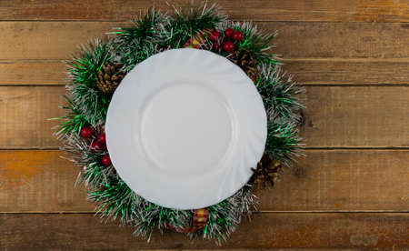 Top view of white plate with napkin. Christmas table setting. Flat lay, top view.の写真素材