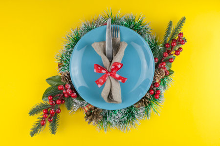 Top view of white plate with napkin. Christmas table setting. Flat lay, top view.の写真素材
