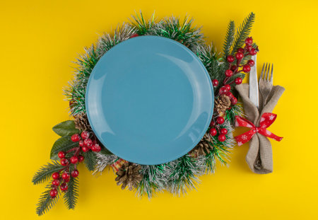 Top view of white plate with napkin. Christmas table setting. Flat lay, top view.の写真素材