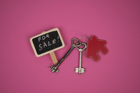 Real Estate Concept. House for sale. Real old blackboard write for sale with miniature houseの写真素材