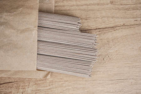 soba - buckwheat noodles (raw buckwheat noodles). soba noodles. food backgroundの写真素材