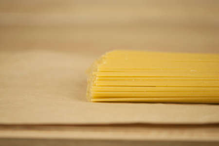 italian spaghetti on wooden background.の写真素材
