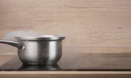 Kitchen sketching. The ladle on a hot stove.の写真素材