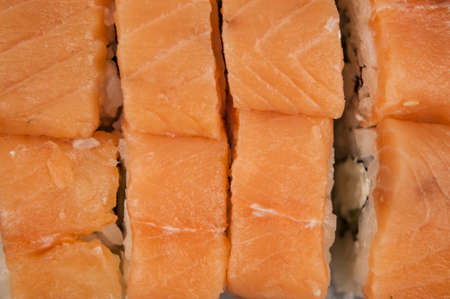beautiful, bright, sushi sets, as a background, against the backdrop, closeup. Top viewの写真素材